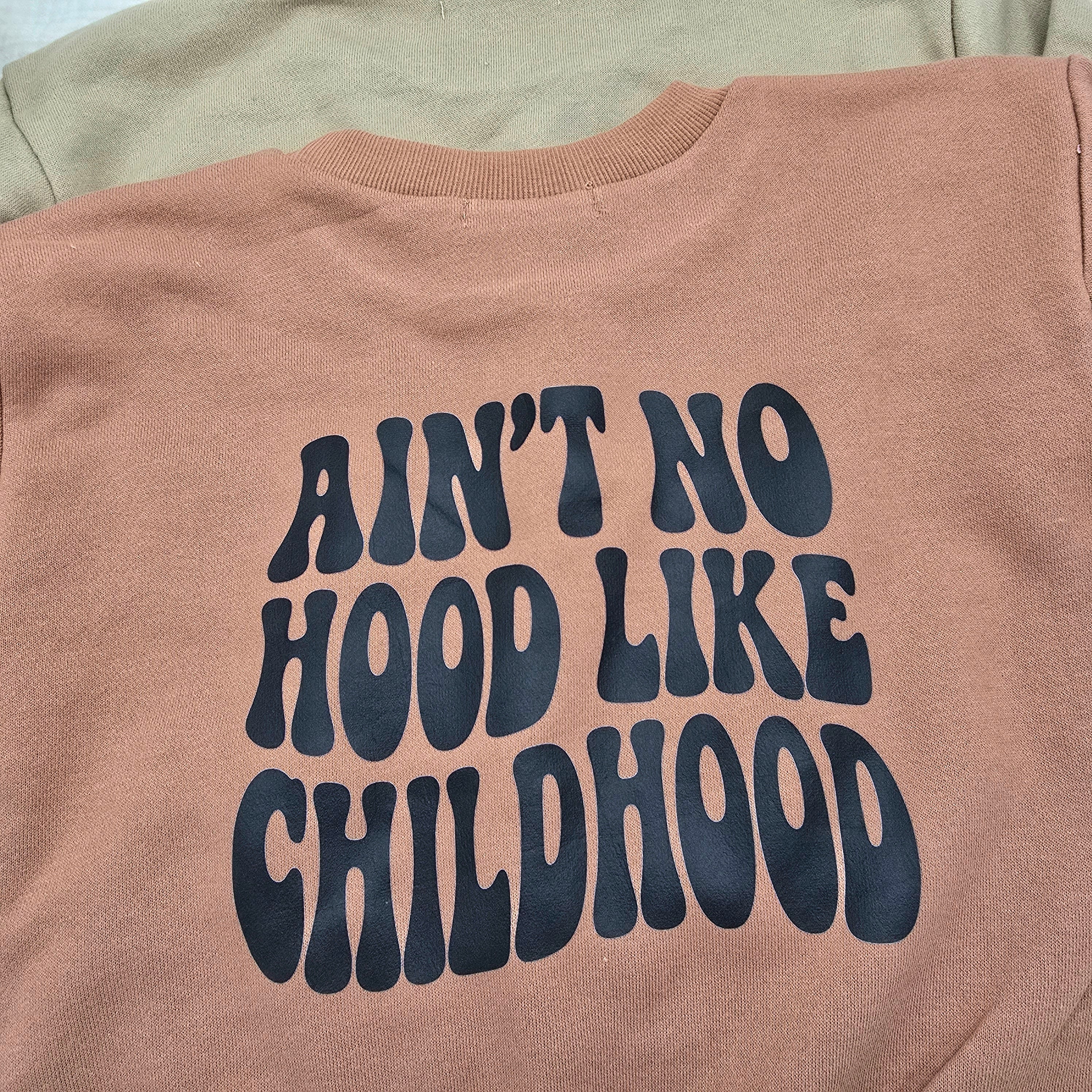 Ain't no hood like childhood Sweater